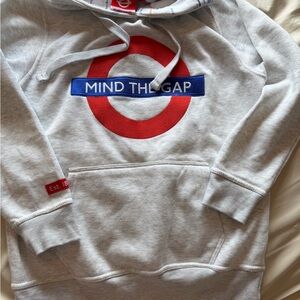 Mind The Gap Crewneck Sweatshirt in Light Gray with Red and Blue Emblem